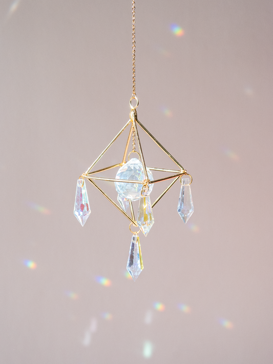 Zonnevanger met kristallen raamdecoratie goud